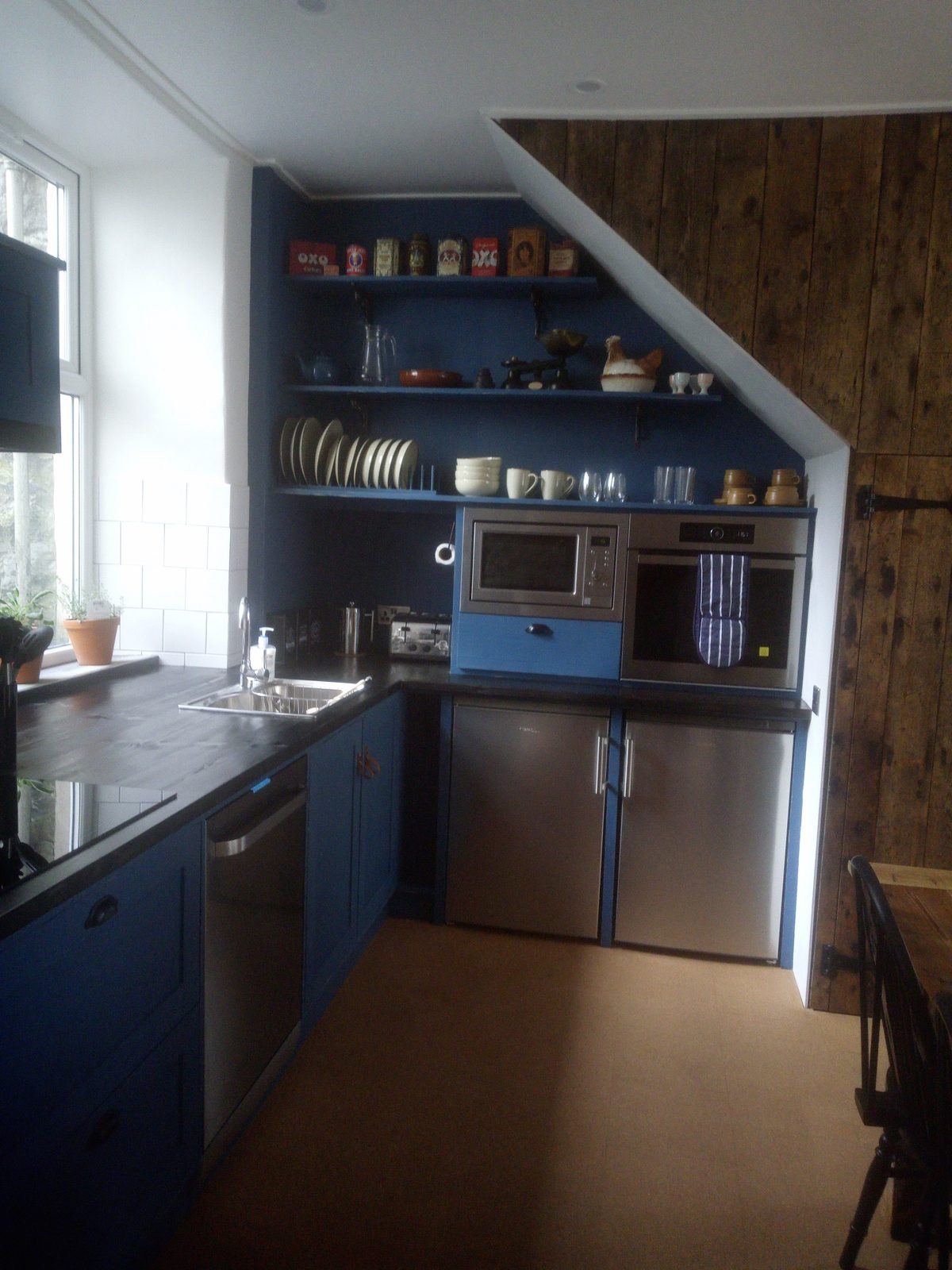 Under stairs kitchenette custom built for a holiday let
